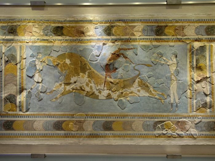 Minoan fresco from the Palace of Knossos depicting acrobatic bull-leaping, a ritual of the Minoan civilization symbolizing the connection between humans and the bull.
