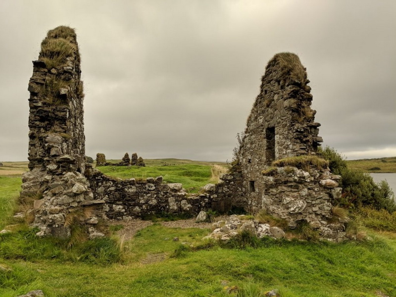 Islands of Loch Finlaggan with ruins visible from a distance