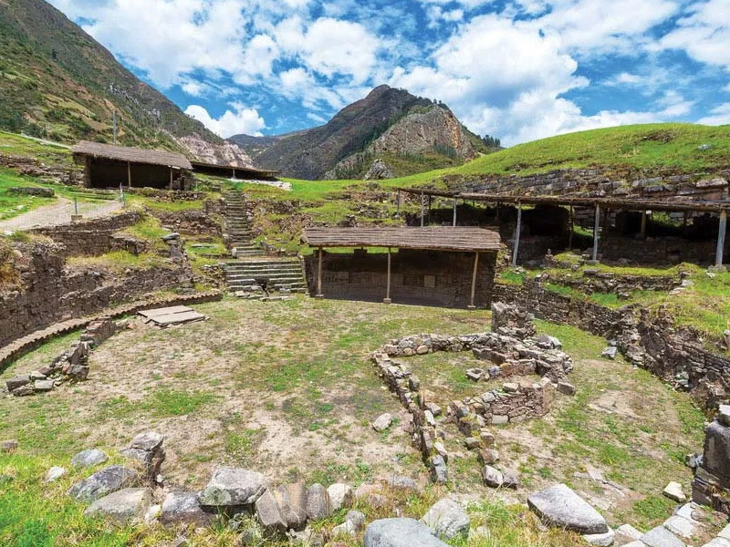 Ancient stone temple complex of Chavin de Huantar in the Peruvian Andes showing massive masonry walls under a clear sky